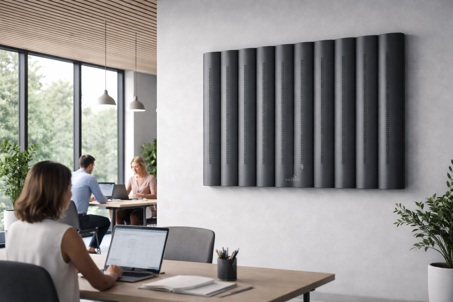 Slim wall-mounted PASSAIR format in a working office interior
